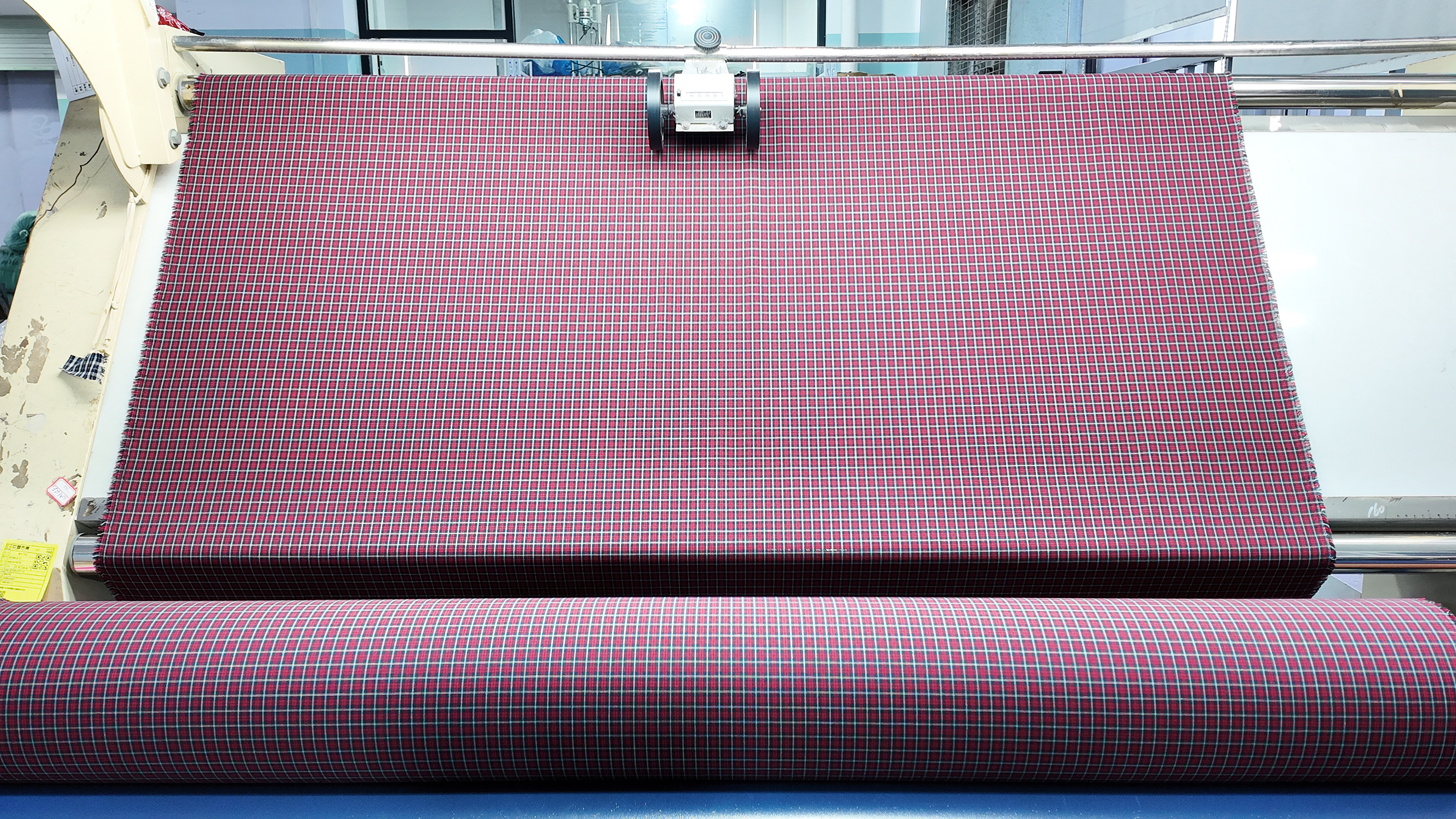 Fabric inspection department at QICHENG garment factory